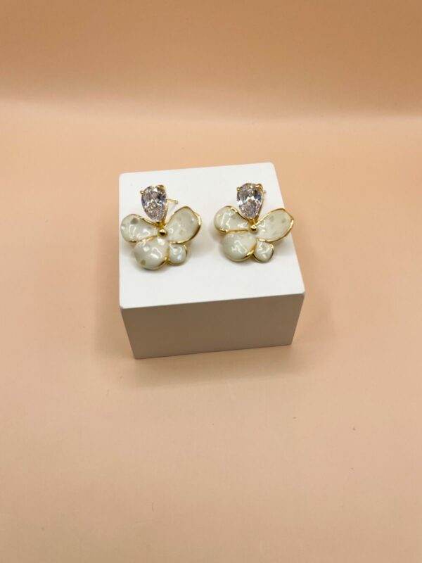 Brinco Flor Esmaltada com Pedra - Banho Dourado